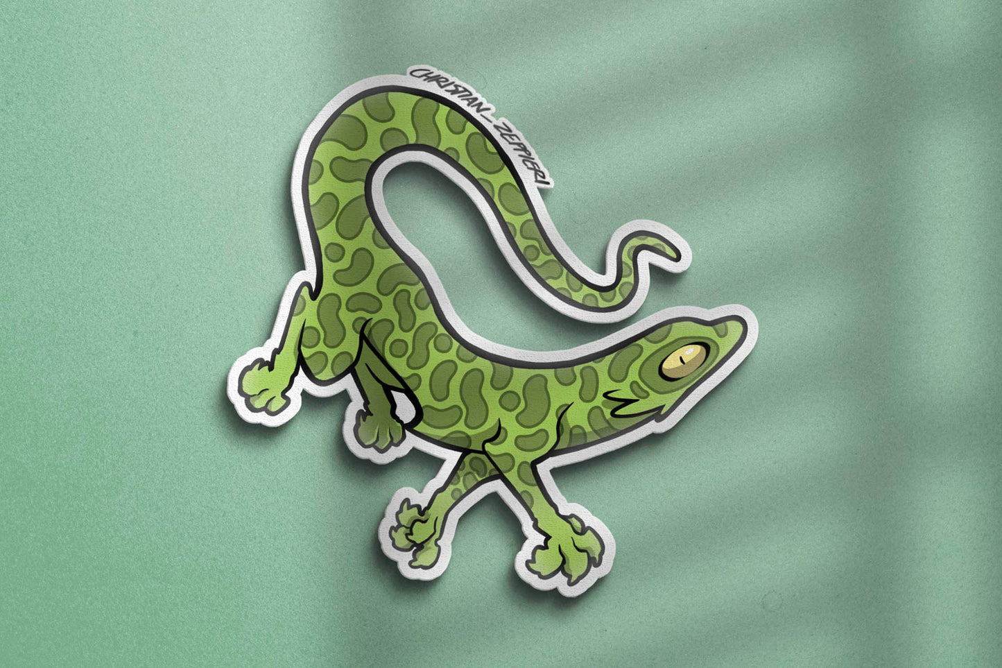 Close-up view of Christian Zeppieri's sticker Green Lizard
