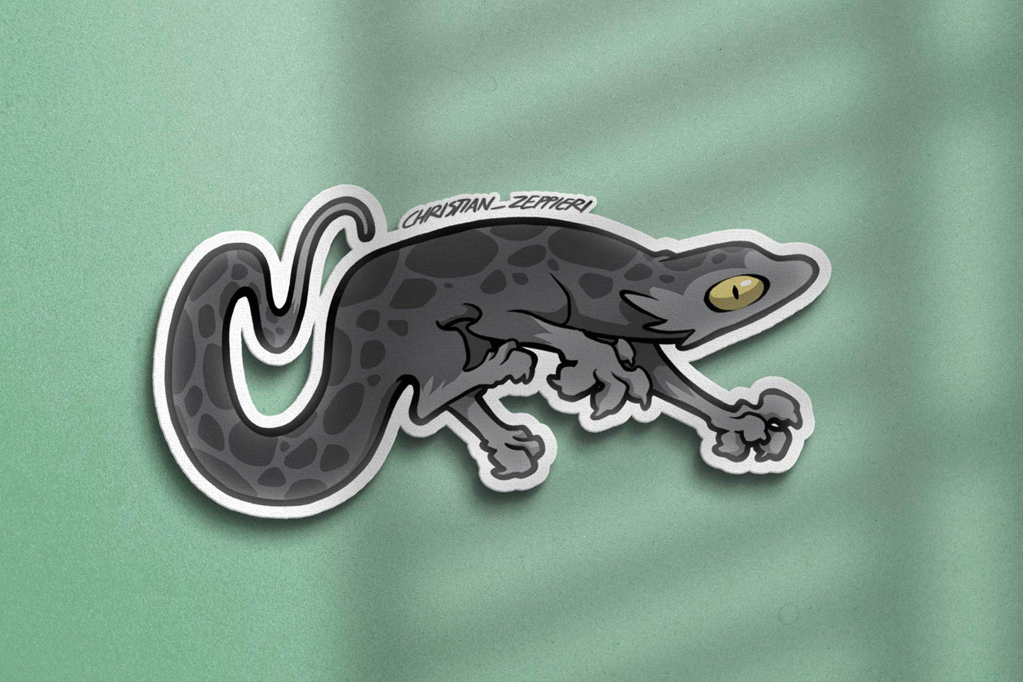 Close-up view of Christian Zeppieri's sticker Black Lizard