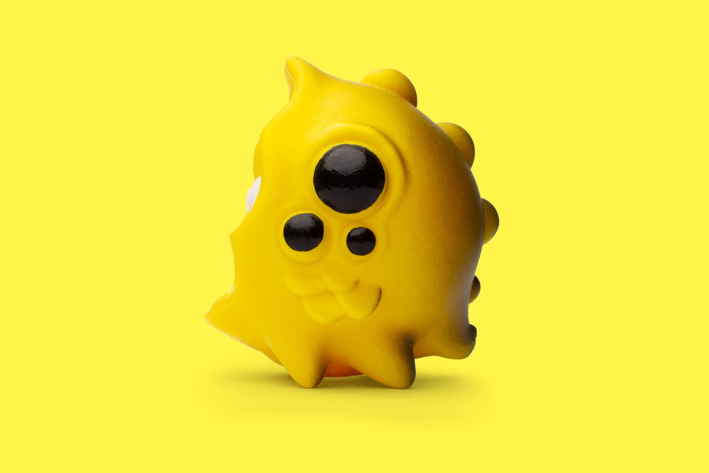 The left side of Zepps' resin sculpture Yellow MoonBeast