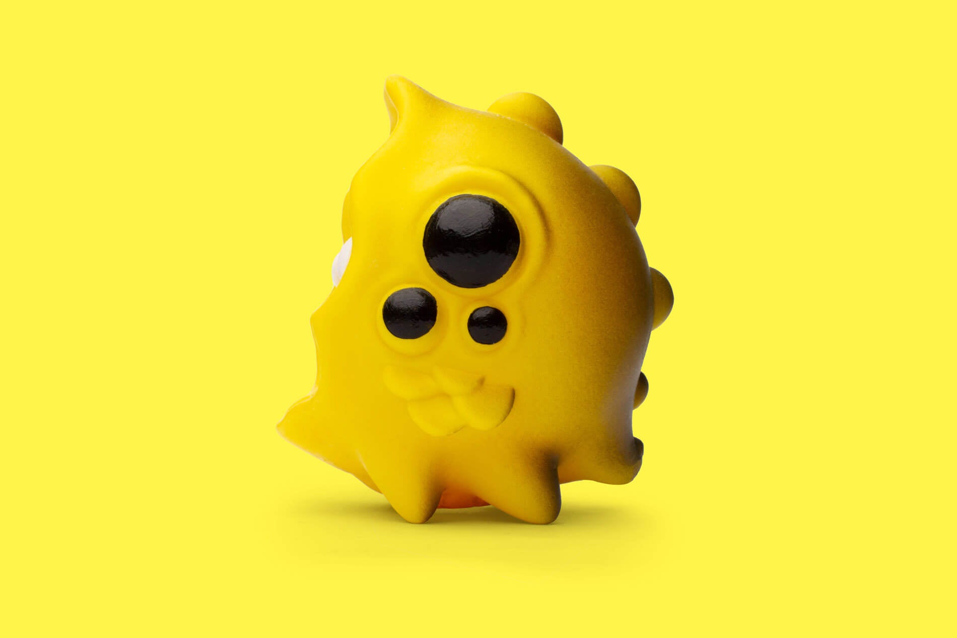 The left side of Zepps' resin sculpture Yellow MoonBeast